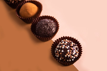 Traditional Brazilian sweet chocolate ball Brigadeiro made with cocoa powder and condensed milk.の写真素材