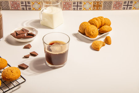 Coffee espresso with chocolate pieces and cookiesの写真素材