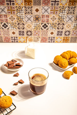 Coffee espresso with chocolate pieces and cookiesの写真素材