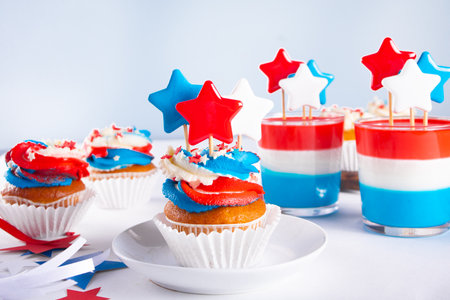 Independence Day Fourth of July USA American patriotic party with american symbols. Cupcakes dessert decorated cream cheese or buttercream.の写真素材