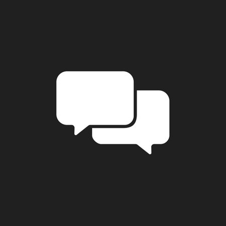 White message bubble icon on black background. Vector illustrationのイラスト素材