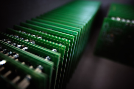 Electronic components assembly hall at high-tech factory blur background with bokehの写真素材