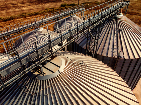 Agriculture background Modern silos for storing cornd and grain harvestの写真素材