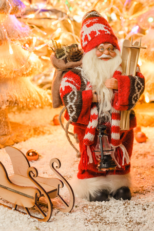 Modern figurine Santa Claus for Christmas Cards with selective focusの写真素材