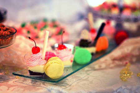 Festive cakes on display at wedding receptionの写真素材