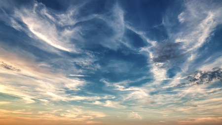 Sunset. blue sky and twilight colored cloudの写真素材
