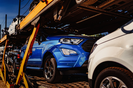 Vehicles loaded and ready for delivery for dealershipの写真素材
