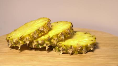 The pineapple sections on the turntableの写真素材