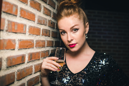 Woman with glass of champagne
