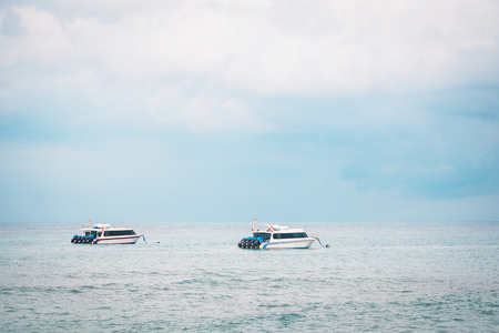 Speed boats in tropical seaの写真素材