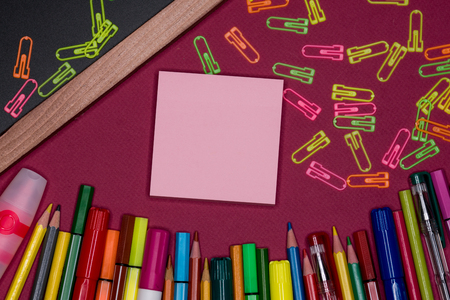 Adhesive notes, blackboard with pencils on background, blank copy spaceの写真素材