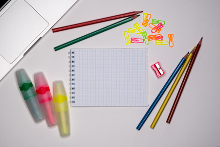 Notepad and stationery on desctop. Text spaceの写真素材