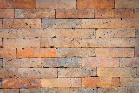 Background of red brick wall texture. Close upの写真素材