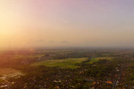 Sunrise landscape on the Bali island. View of mounts, Ubud village, rice fields.の写真素材
