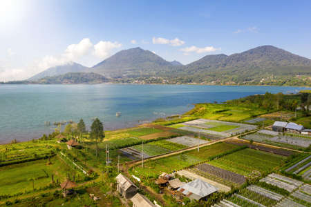 Bratan lake, sunrise. Bali nature mountainous landscape. Aerial viewの写真素材