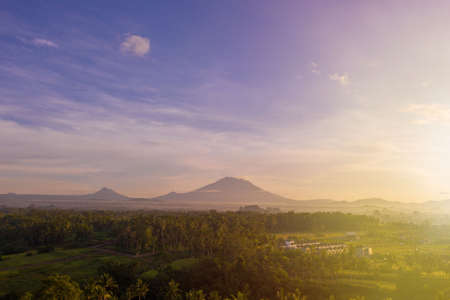 Sunrise landscape on island of Bali. View of mountains, Ubud village and rice fields.の写真素材
