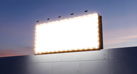 An intensely glowing blank billboard dominates the frame against a soft twilight sky. Its bright white surface offers a pristine canvas for any advertisement or message, symbolizing urban marketing opportunity.の素材