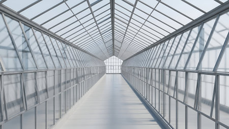 A symmetrical view of a glass tunnel, showcasing modern architecture. The geometric design creates a sense of depth and perspective, with light filtering through the structure.の素材