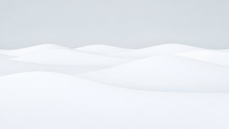A minimalist landscape featuring smooth, white snow dunes under a pale, overcast sky. The scene evokes a sense of calm and tranquility with its simple composition.の素材