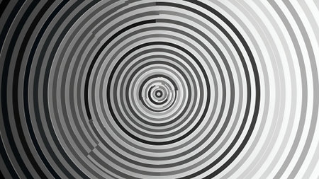 A mesmerizing black and white abstract background. Hypnotic concentric circles with a gradient from dark to light create an optical illusion of a deep, spinning vortex.の素材