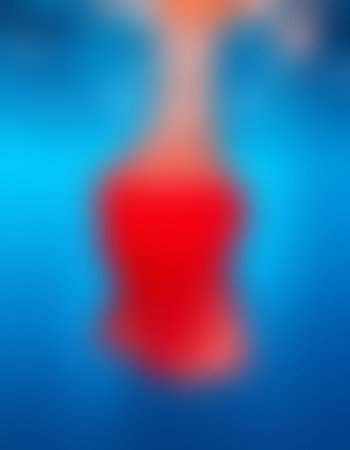 abstract blue background with some smooth lines in it and highlighted by redの写真素材