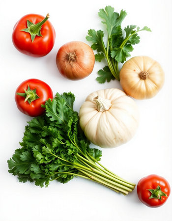 Tomatoes, onion, garlic and parsley on a white backgroundの写真素材