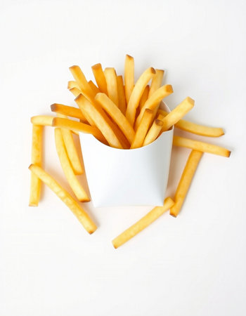 French fries in a white box on a white background, top view
