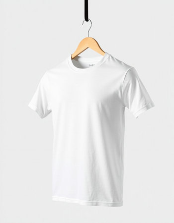 White t-shirt hanging on a hanger isolated on white backgroundの写真素材