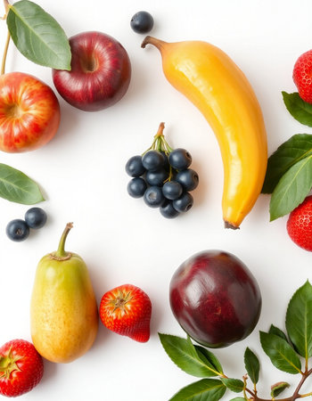 Flat lay composition with fruits and berries on white background, top viewの写真素材