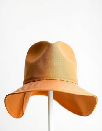 Women's hat on a mannequin isolated on a white backgroundの写真素材