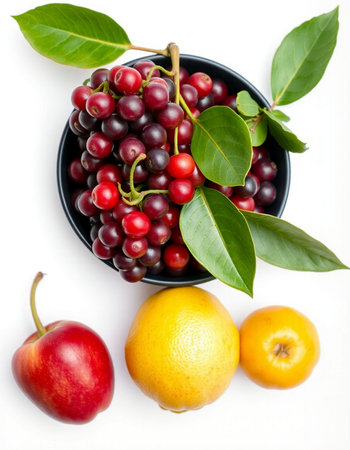 Fruits and berries in a bowl isolated on a white background.