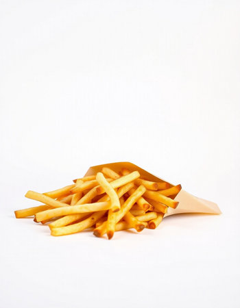 French fries in a paper box on a white background. Isolated