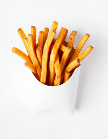 French fries in a white box on a white background, top view