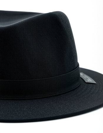 Black hat isolated on a white background. Shallow depth of field.の写真素材