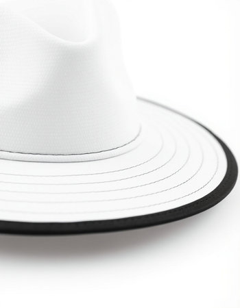 White hat on a white background. Shallow depth of field.の写真素材