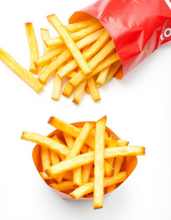 Golden French fries in a red package on a white background. Isolated