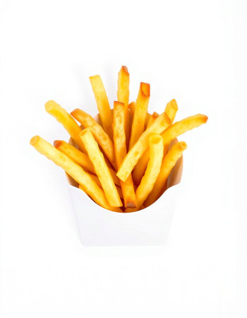 French fries in a paper box on a white background. Isolatedの写真素材