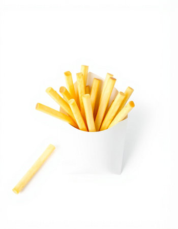 French fries in paper box isolated on white background. Top view.