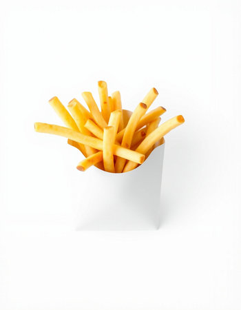 French fries in paper box isolated on white background. Top view.