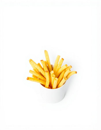 French fries in a paper cup on a white background, top viewの写真素材