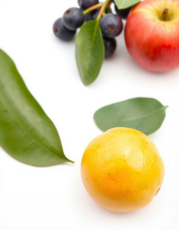 Fresh fruits on a white background. Shallow depth of field.の写真素材