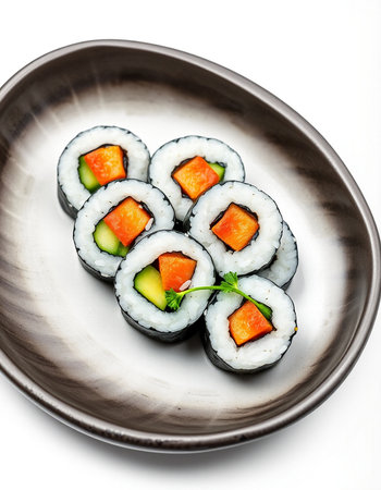 Sushi roll with salmon and cucumber on a white background.の写真素材