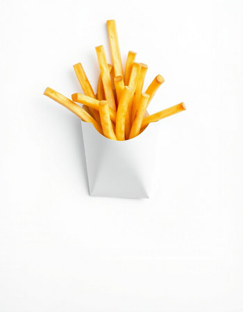 French fries in a paper box on a white background, top view