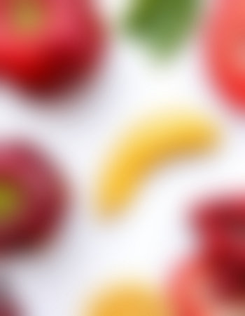 Colorful abstract background. Blurred image of red and yellow apples.の写真素材