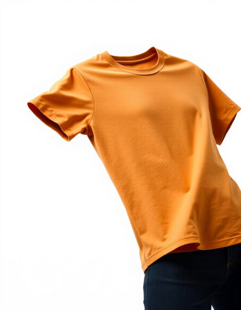 Orange t-shirt on a mannequin isolated on white backgroundの写真素材