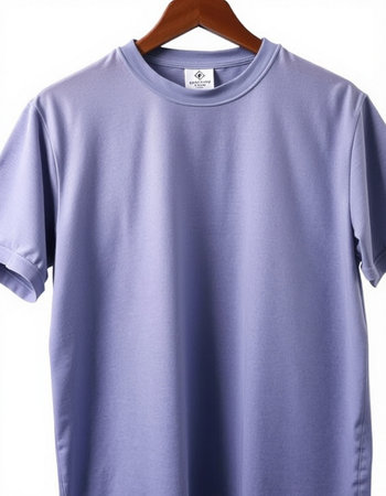 Purple t-shirt on a hanger on a white backgroundの写真素材
