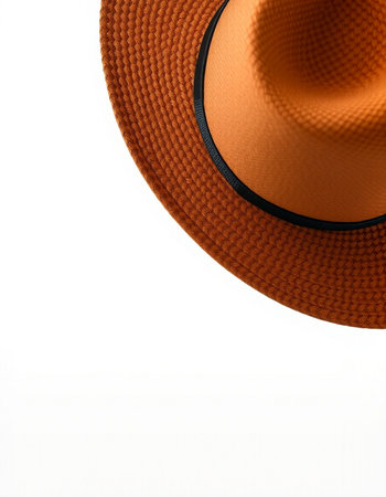 Orange hat isolated on white background with copy space for your text.の写真素材