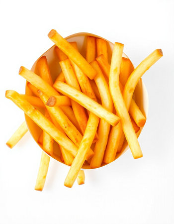 French fries in a bowl isolated on white background, top view.