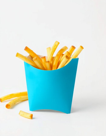 French fries in a blue box on a white background, fast foodの写真素材