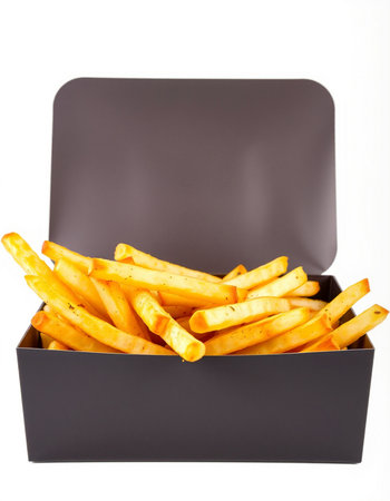 French fries in a black box on a white background. Isolated